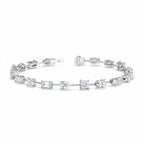 My Store 4 tennis bracelet featuring mixed fancy cut diamonds in pear, emerald, princess, oval, and round shapes.