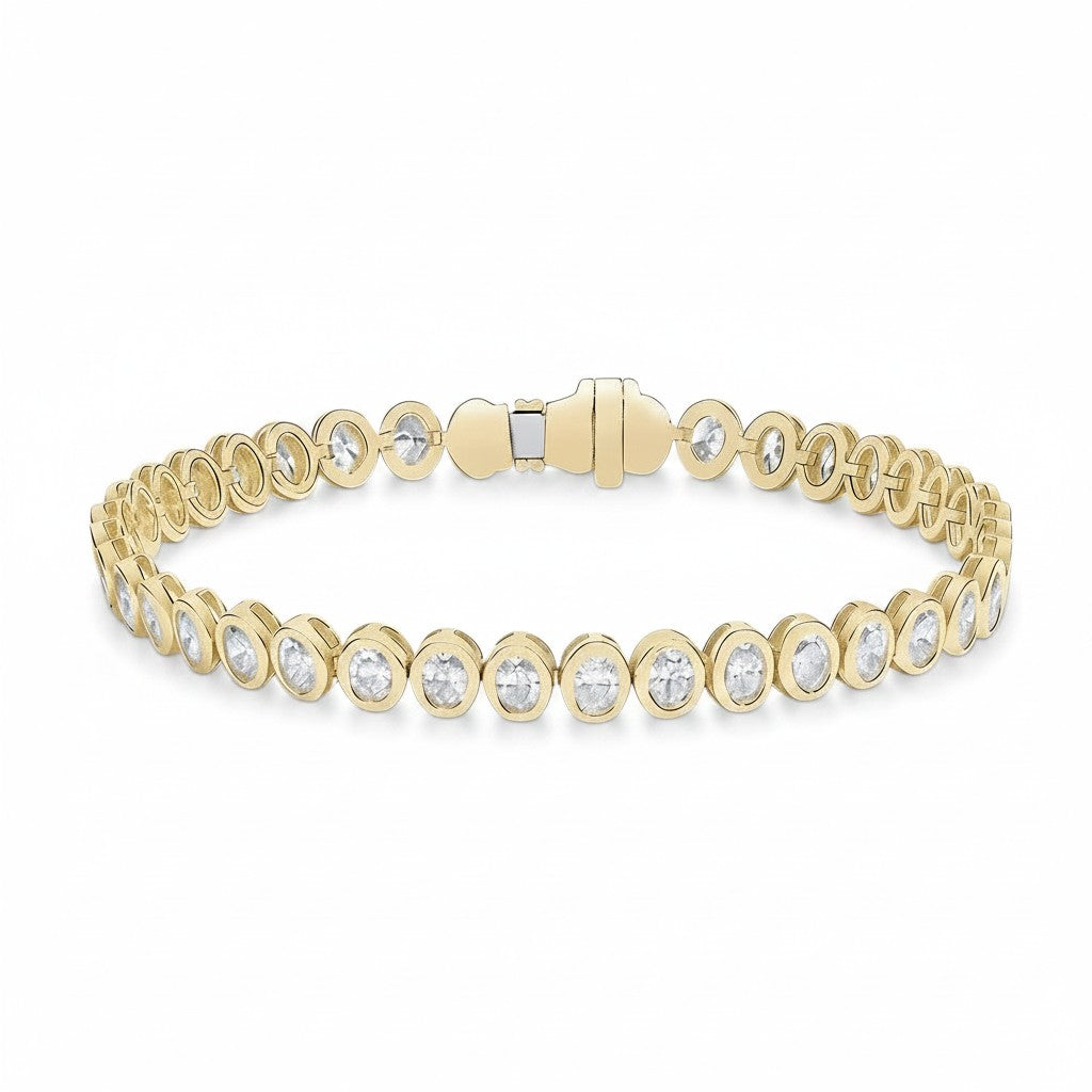 My Store 4 oval cut diamond tennis bracelet in 14K yellow gold with a protective bezel setting and secure box clasp.