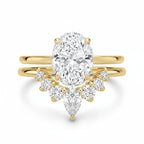 My Store 4 18K solid gold bridal ring set with a 1.5ct oval lab-grown diamond and pear-shaped accent stones.