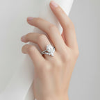 My Store 4 18K solid gold bridal set featuring a 1.5ct oval lab-grown diamond with a pear-accented contour band.