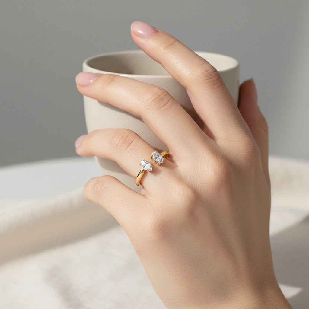 My Store 4 18K solid gold engagement ring featuring two oval lab-grown diamonds on a unique open band design