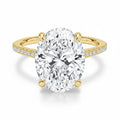 My Store 4 18K solid gold engagement ring featuring a 4 carat oval lab-grown diamond with a hidden halo and pavé band.