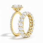 My Store 4 oval diamond halo engagement ring and matching oval eternity wedding band set in 18K yellow gold.