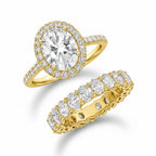 My Store 4 oval diamond halo engagement ring and matching oval eternity wedding band set in 18k yellow gold.