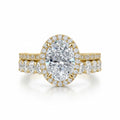 My Store 4 oval diamond halo engagement ring and matching eternity band set in 18K yellow gold on white background.