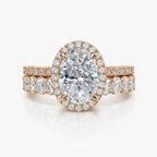 My Store 4 oval diamond halo engagement ring and matching oval eternity wedding band set in rose gold.