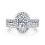 My Store 4 oval diamond halo engagement ring and matching oval eternity wedding band set in white gold.
