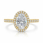 My Store 4 oval diamond halo engagement ring in 18K yellow gold with a micro-pavé diamond shank on a white background.