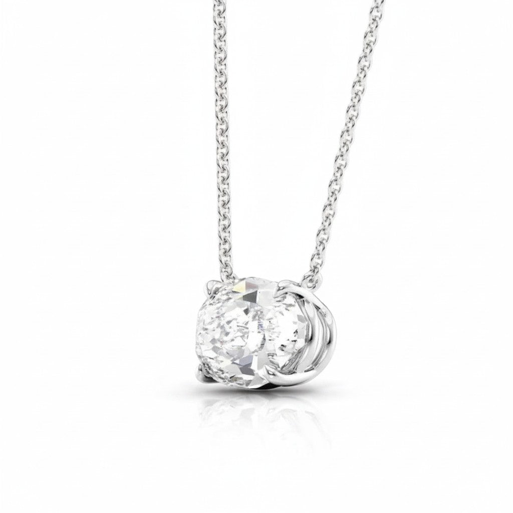 My Store 4 oval diamond solitaire pendant necklace in white gold with a horizontal east-west setting on a fine chain.