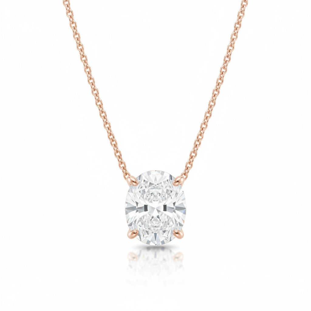 My Store 4 oval-cut diamond solitaire pendant necklace in rose gold with a horizontal east-west setting on a fine chain.