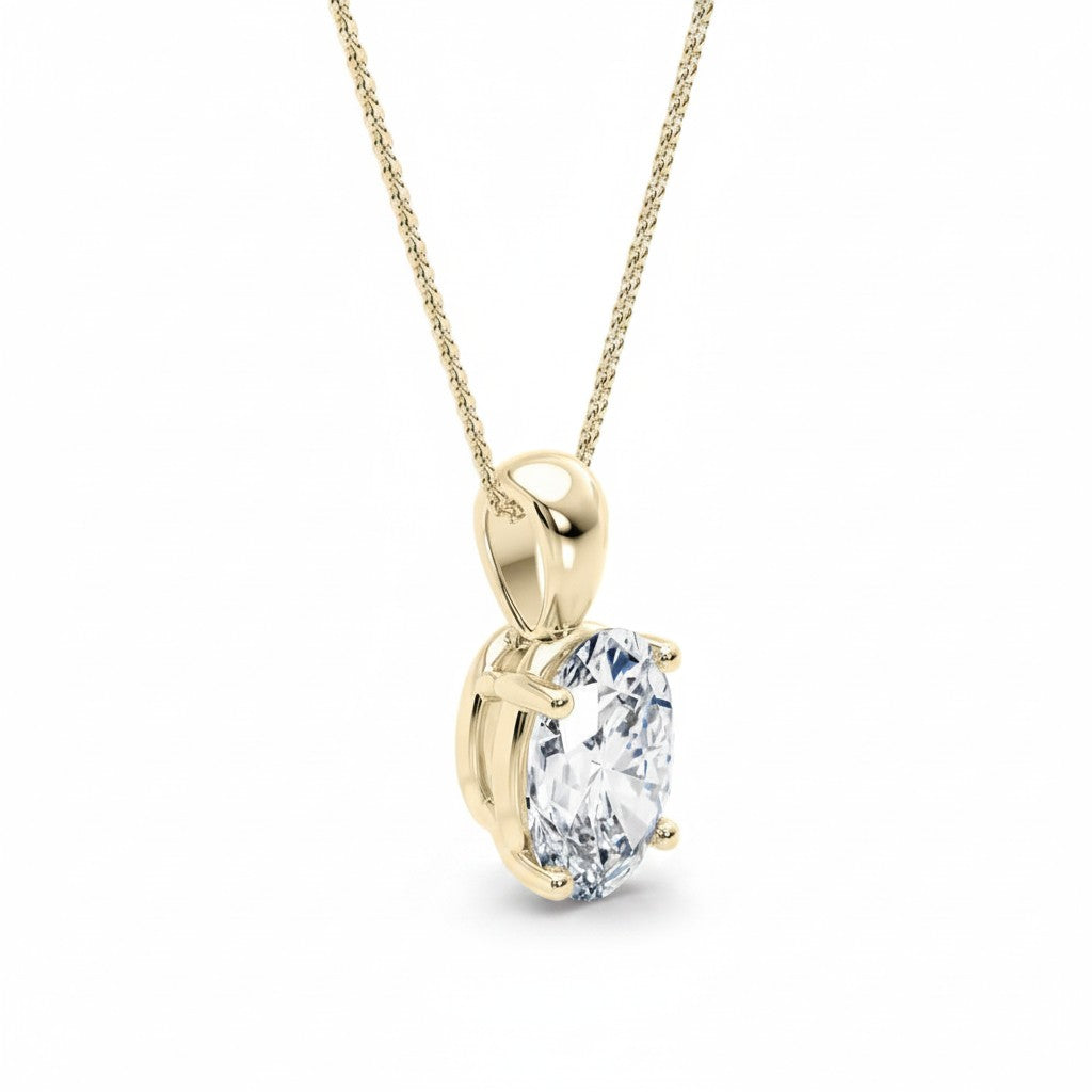 My Store 4 oval diamond solitaire pendant in 18K yellow gold with a four-prong setting on a fine cable chain.