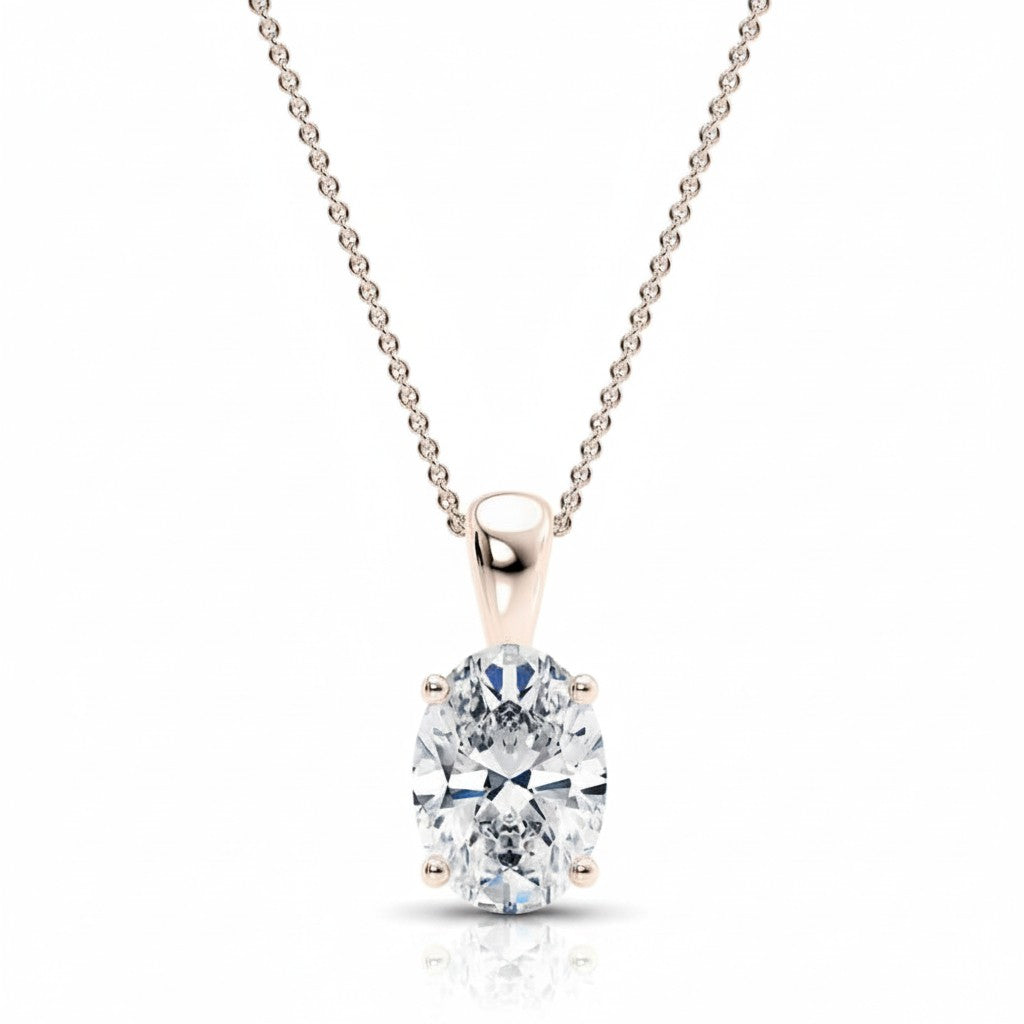 My Store 4 oval diamond solitaire pendant in 18K yellow gold with a four-prong setting on a delicate cable chain.