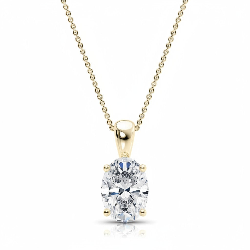 My Store 4 oval diamond solitaire pendant in 18K yellow gold with a four-prong setting on a delicate cable chain.