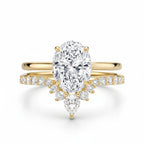 My Store 4 18K solid gold bridal set featuring an oval lab-grown diamond solitaire and a V-shaped pavé wedding band.