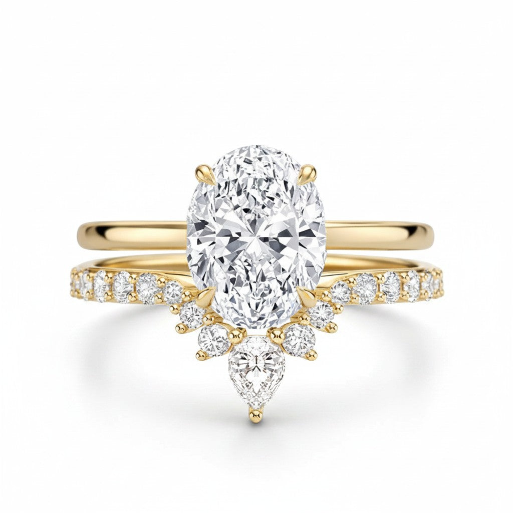 My Store 4 18K solid gold bridal set featuring an oval lab-grown diamond solitaire and a V-shaped pavé wedding band.