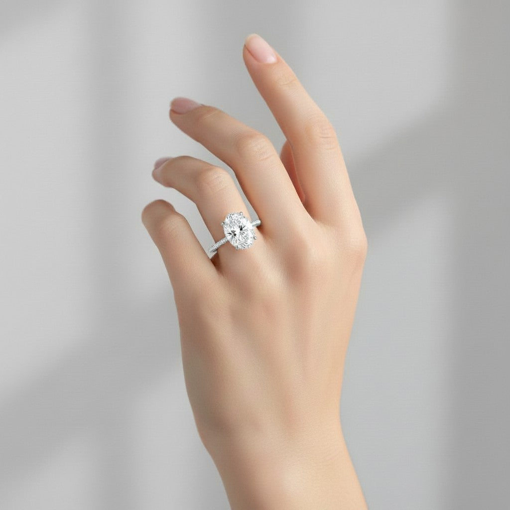 My Store 4 18K white gold oval lab-grown diamond engagement ring with a hidden halo and pavé cathedral setting