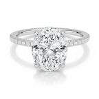 My Store 4 18K white gold oval lab-grown diamond engagement ring with a hidden halo and pavé diamond band.