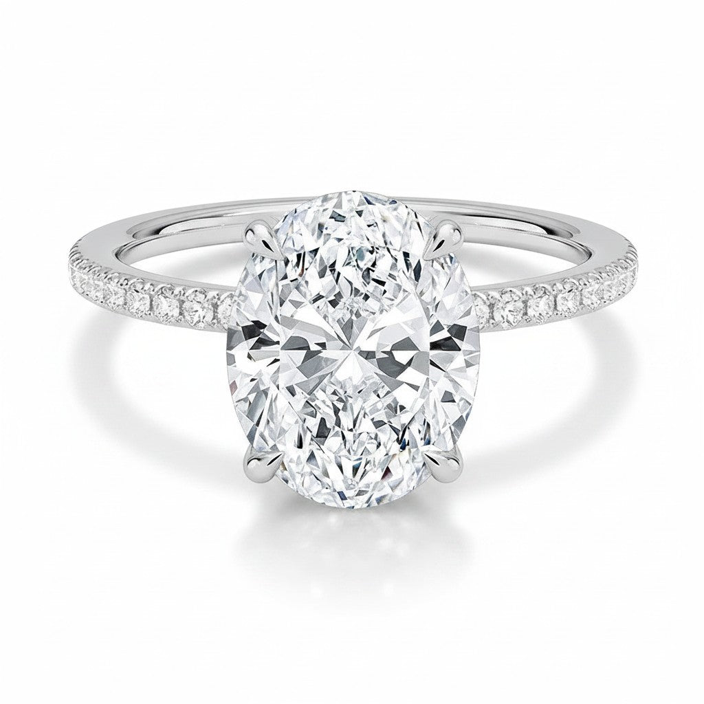 My Store 4 18K white gold oval lab-grown diamond engagement ring with a hidden halo and pavé diamond band.