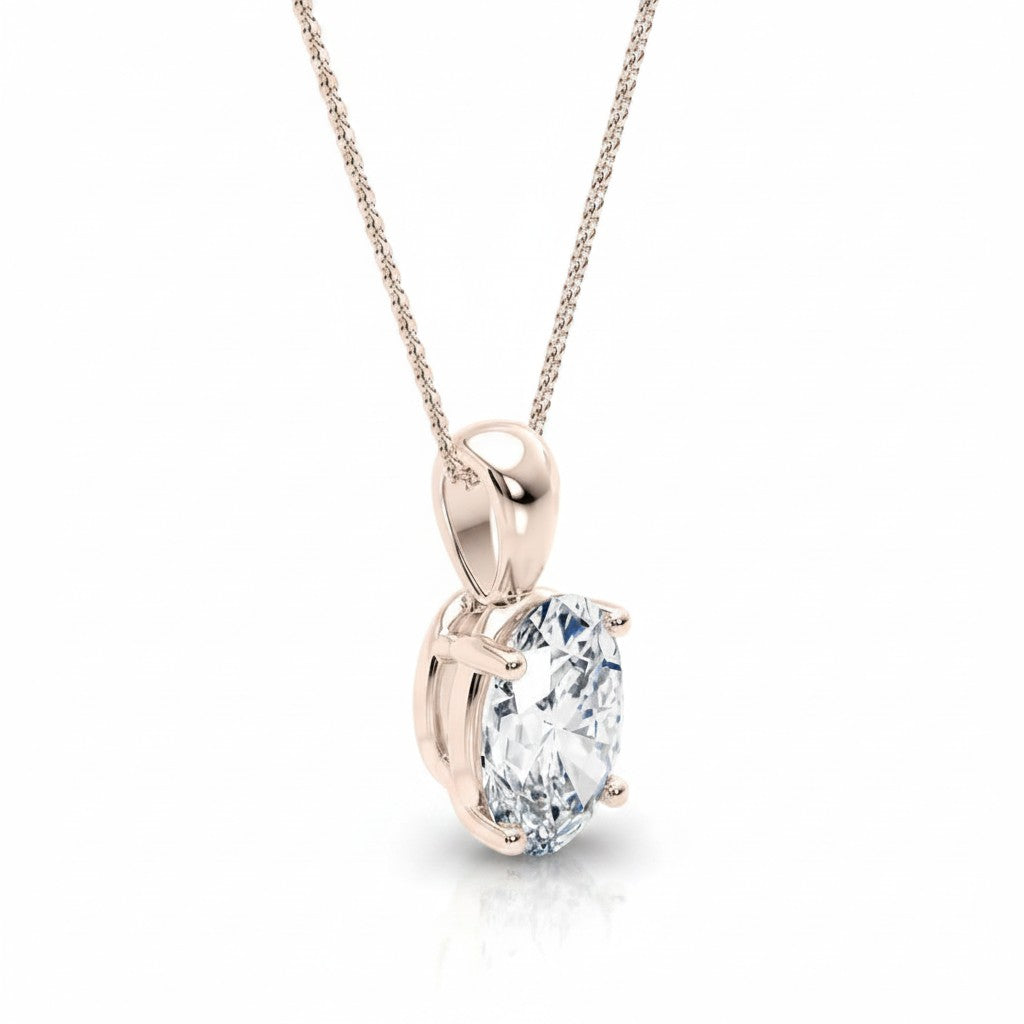 My Store 4 oval diamond solitaire pendant in 18K rose gold with a four-prong setting on a delicate cable chain.