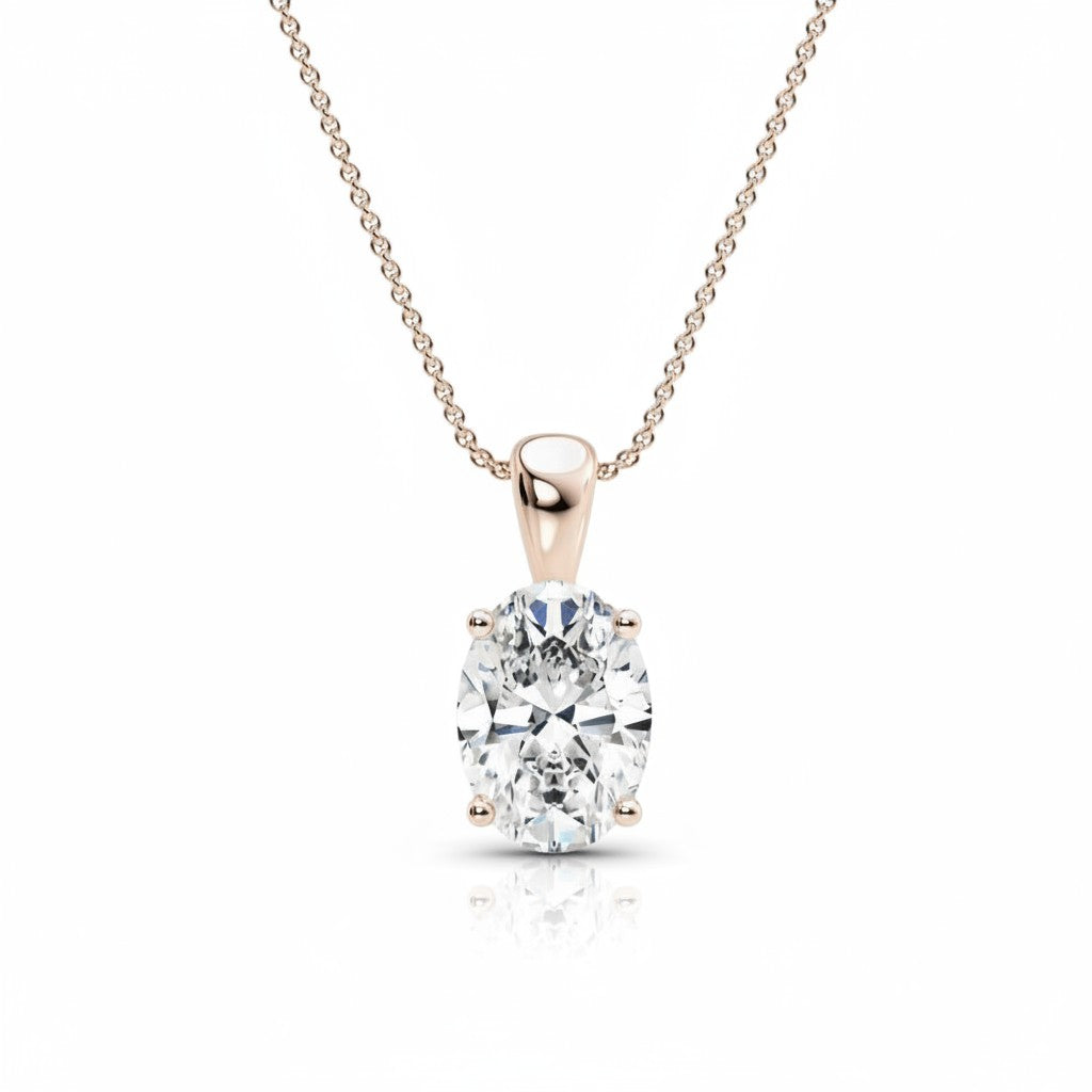 My Store 4 oval diamond solitaire pendant necklace in 18K yellow gold with a four-prong setting on a fine cable chain.