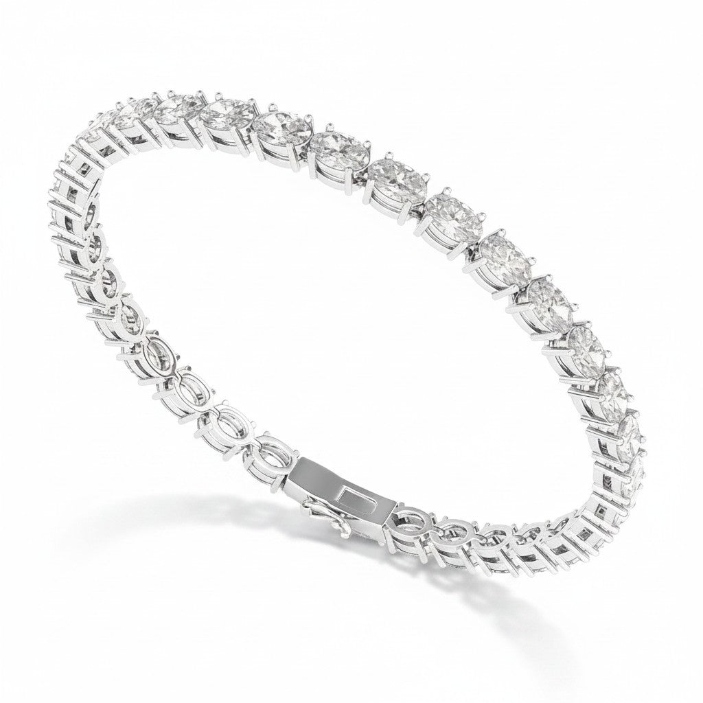 My Store 4 white gold tennis bracelet featuring horizontally set oval cut diamonds in a secure basket setting.