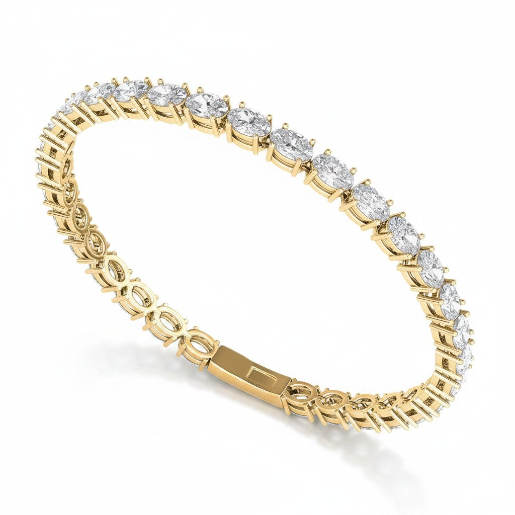 My Store 4 East-West oval cut diamond tennis bracelet in 14K yellow gold with a secure box clasp and safety latches.