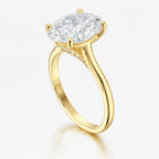 My Store 4 oval cut solitaire engagement ring in yellow gold with a micro-pavé hidden halo and cathedral shoulders.