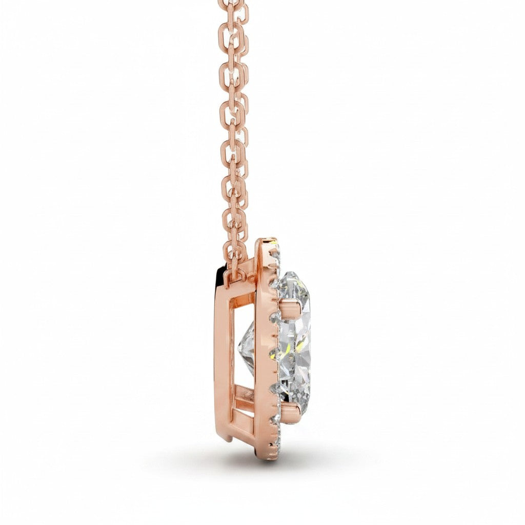 My Store 4 oval halo floating diamond pendant in rose gold, side profile view showing the bail-free setting.