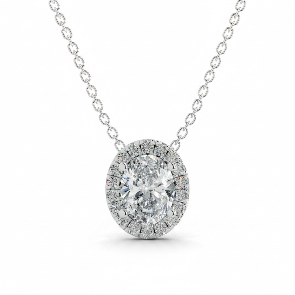 My Store 4 oval halo diamond pendant necklace in white gold with a delicate cable chain on a white background.