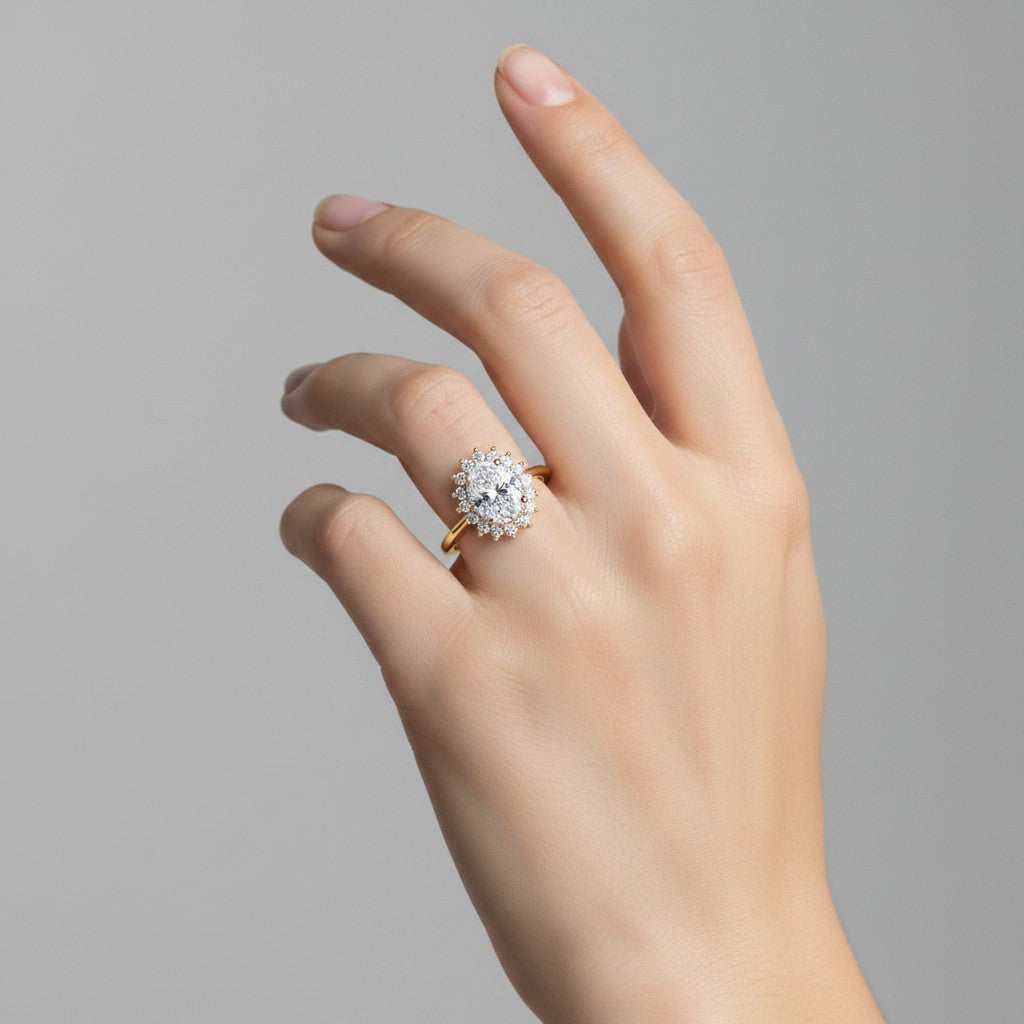 My Store 4 18K solid gold oval halo diamond ring worn on a woman's finger, showcasing vintage-inspired elegance.