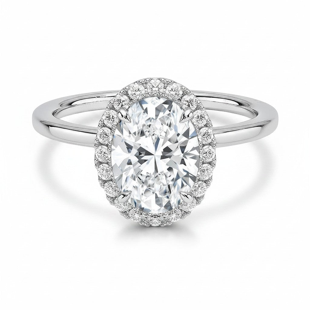My Store 4 18K solid gold halo engagement ring featuring a brilliant oval lab-grown diamond with diamond accents.