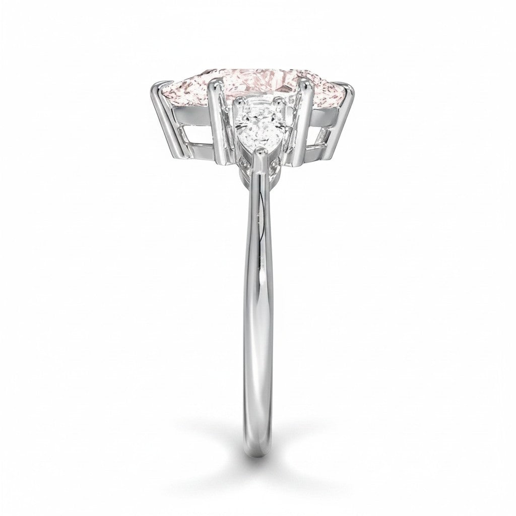 My Store 4 18K solid gold ring featuring an oval fancy color diamond with heart-cut side stones, side profile view.