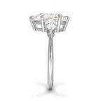My Store 4 18K solid gold ring featuring an oval fancy color diamond with heart-cut side stones, side profile view.
