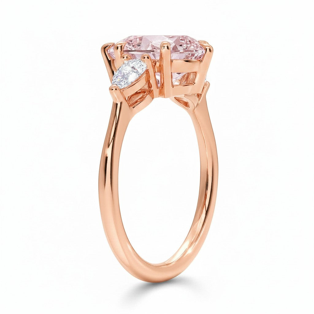 My Store 4 18K rose gold ring featuring an oval fancy color diamond with heart-shaped side stones