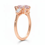My Store 4 18K rose gold ring featuring an oval fancy color diamond with heart-shaped side stones