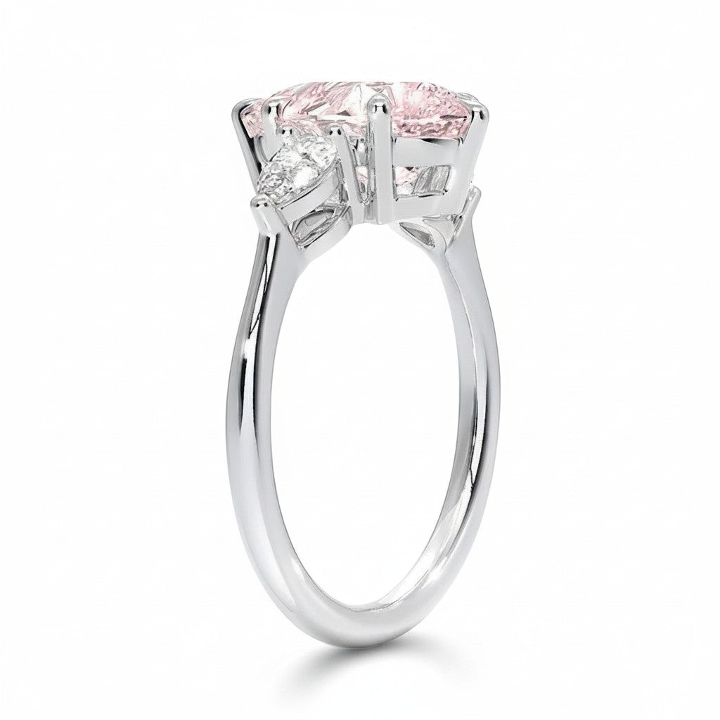 My Store 4 18K solid gold ring featuring an oval fancy color diamond with heart-shaped side stones on a white background