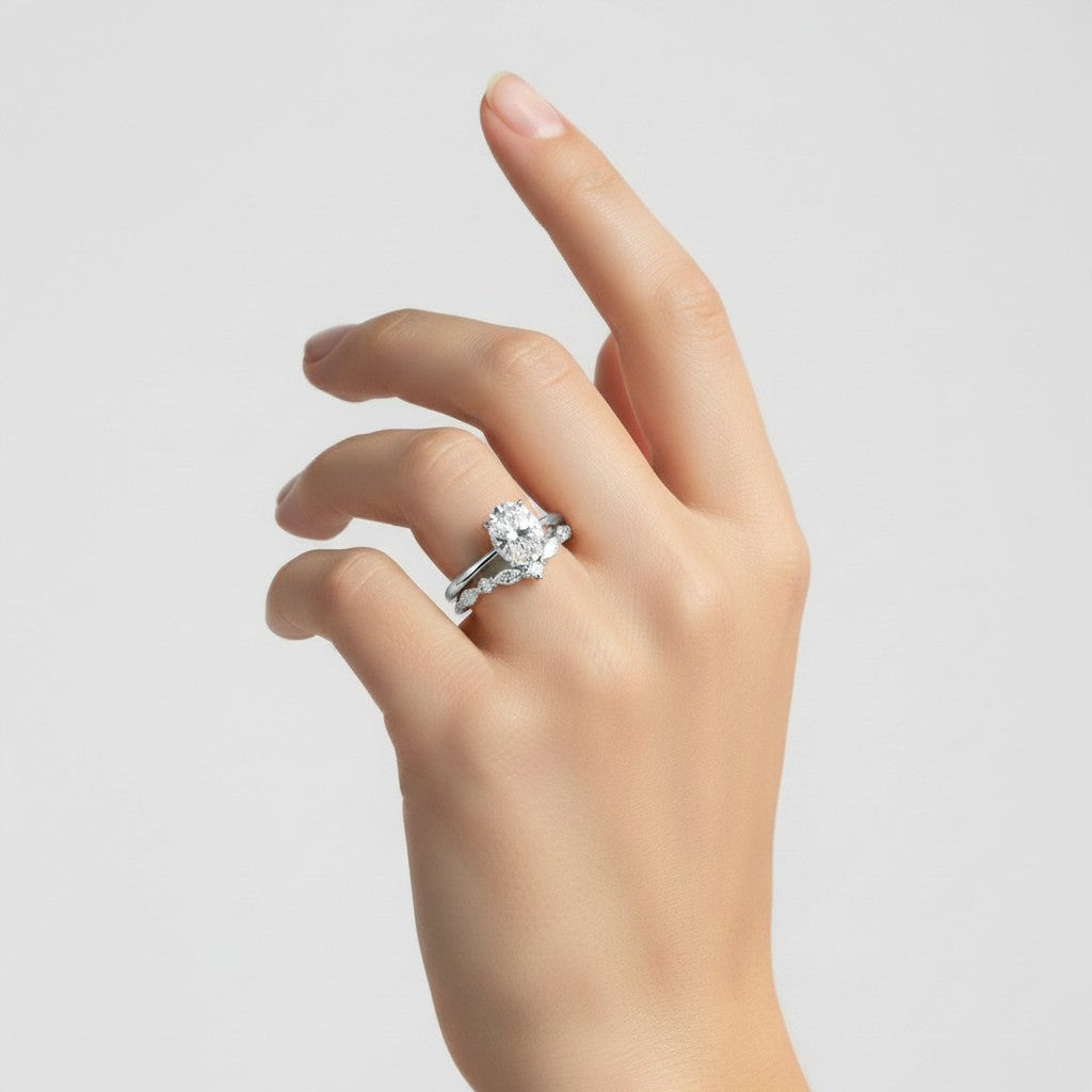 My Store 4 18K solid gold Antoinette oval lab-grown diamond ring set worn on a woman's finger