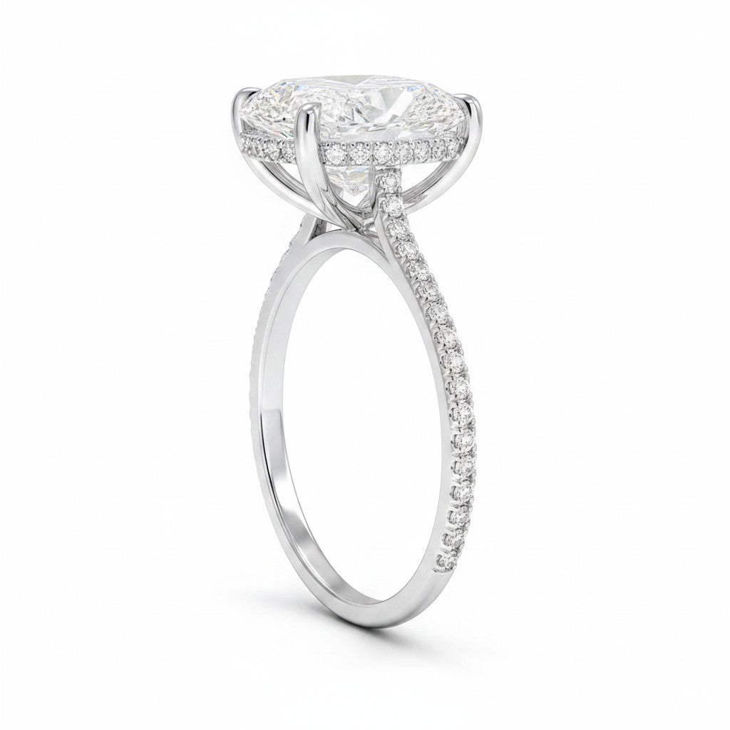 My Store 4 18K solid gold engagement ring with a 4 carat oval lab-grown diamond, hidden halo, and 3/4 pavé setting.