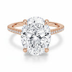 My Store 4 18K rose gold engagement ring featuring a 4 carat oval lab-grown diamond with a hidden halo and pavé band.
