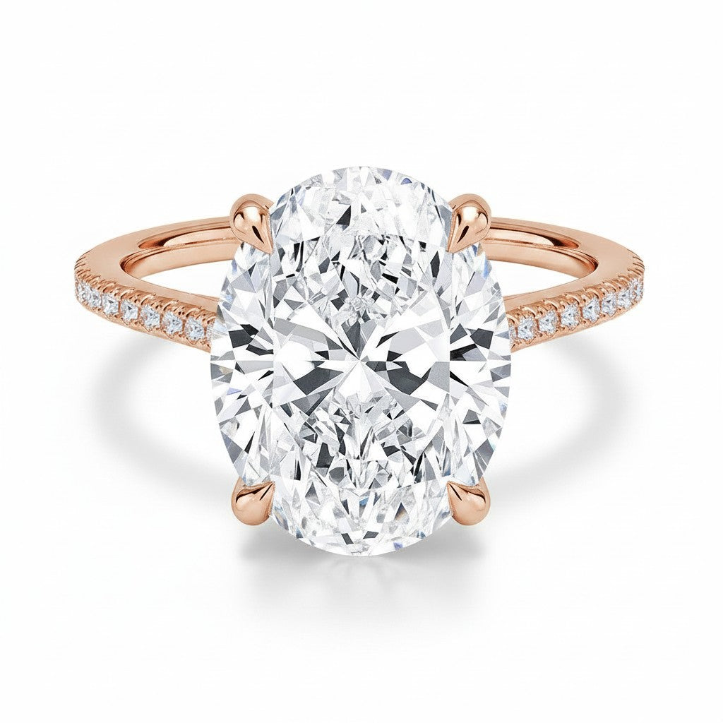 My Store 4 18K rose gold engagement ring featuring a 4 carat oval lab-grown diamond with a hidden halo and pavé band.