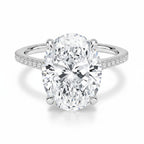 My Store 4 18K solid gold engagement ring featuring a 4 carat oval lab-grown diamond with a hidden halo and pavé band.