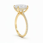 My Store 4 18K gold engagement ring with a 4 carat oval lab diamond, hidden halo, and 3/4 pavé diamond band.