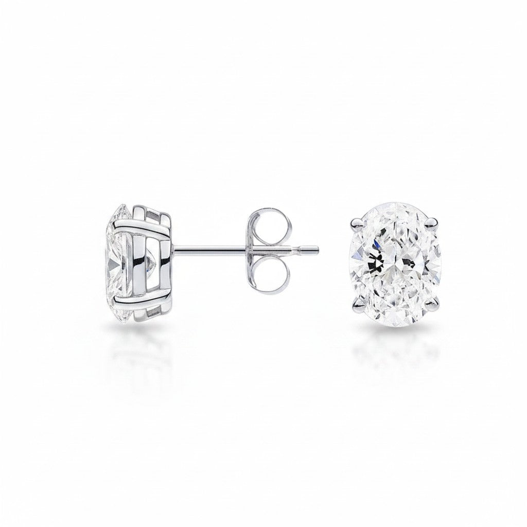 My Store 4 18K solid gold stud earrings featuring 2 carat oval cut lab-grown diamonds with a brilliant sparkle