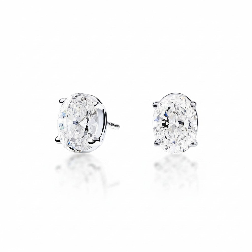 My Store 4 18K solid gold stud earrings featuring 2 carat oval cut lab-grown diamonds with brilliant sparkle.