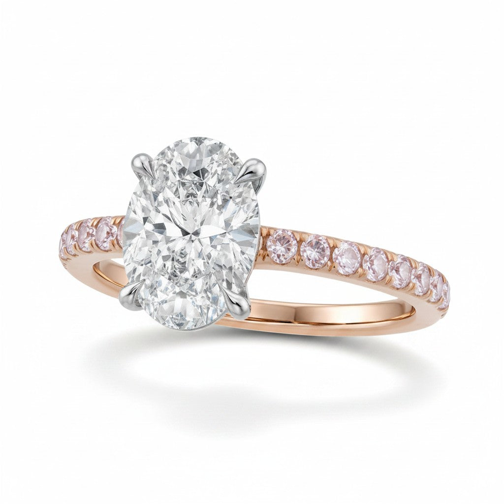 My Store 4 18K solid gold ring featuring a central oval diamond and pink pavé diamond accents on the band.