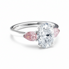 My Store 4 18K solid gold trilogy ring featuring a central oval diamond flanked by two pear-cut pink diamonds.