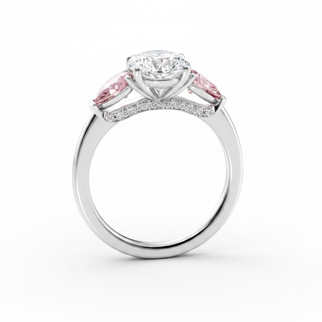 My Store 4 18K solid gold trilogy engagement ring featuring a central oval diamond and pink pear-cut side stones.