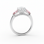 My Store 4 18K solid gold trilogy engagement ring featuring a central oval diamond and pink pear-cut side stones.