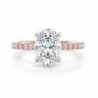 My Store 4 18K solid gold ring featuring a central oval diamond with a pink pavé diamond band