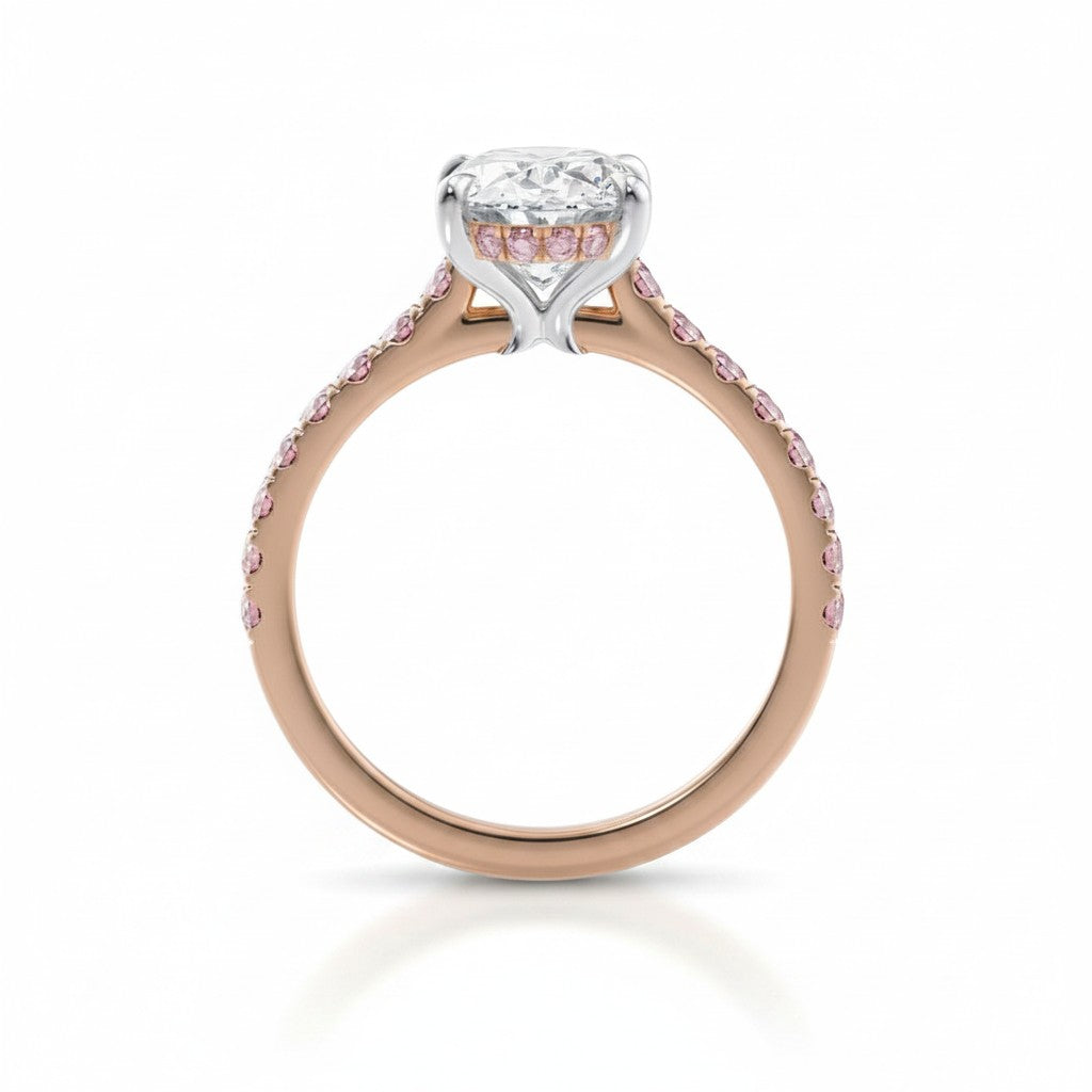 My Store 4 18K rose gold ring featuring a central oval diamond with pink pavé diamond accents on the band